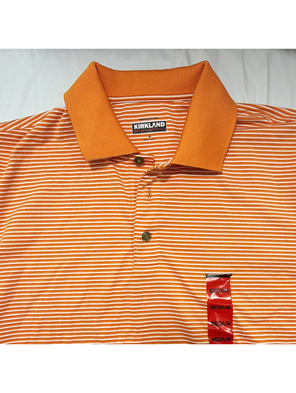 Kirkland Signature Performance Polo Men's M Orange/White Striped Short Sleeve